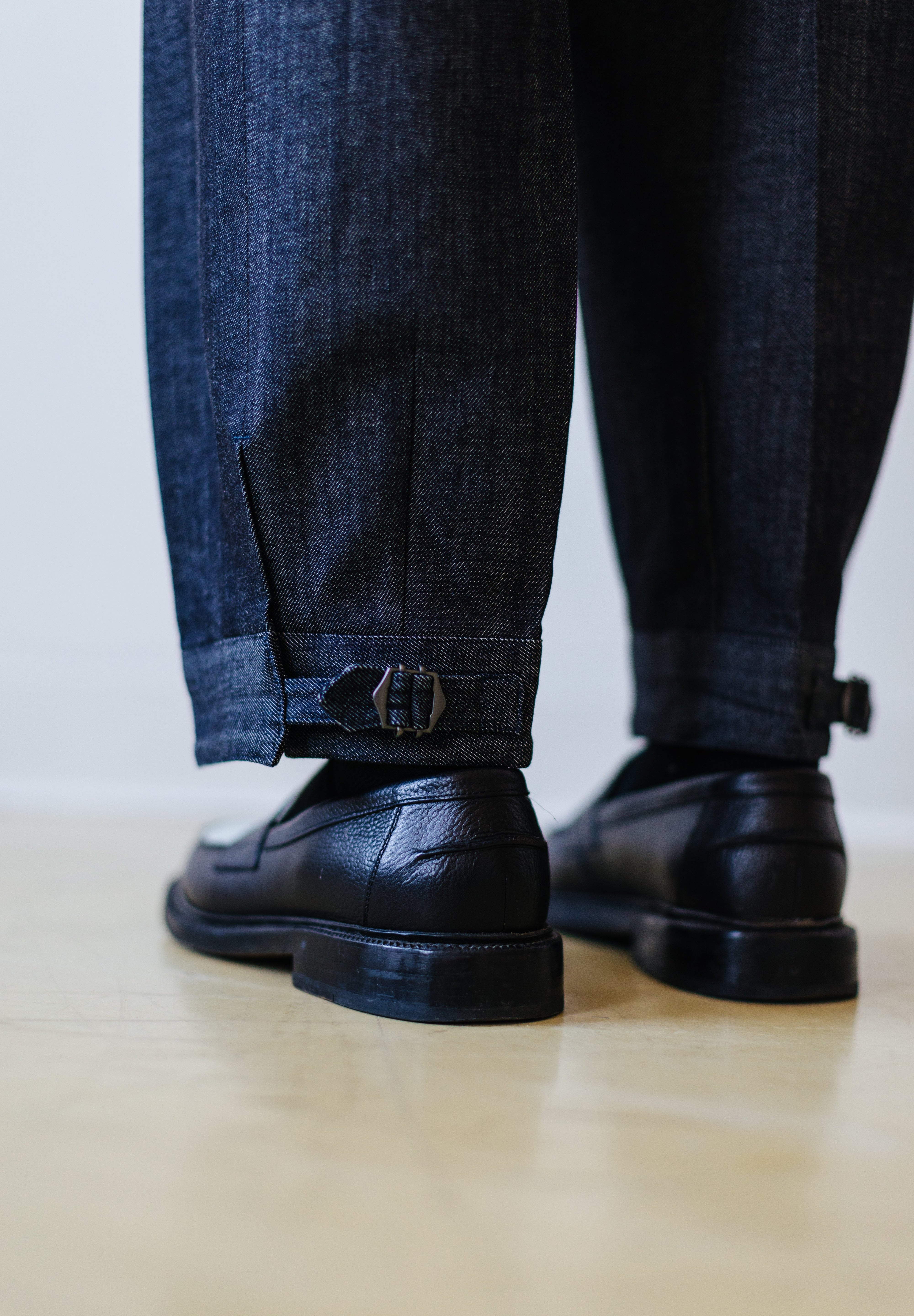 Brown suit and side adjuster